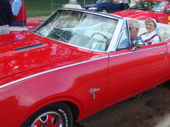 Kent Person in convertible previously owned by Stu Hasselquist (Class of 1962, deceased)