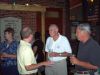 Doug McNeil and Bob Rager visit with Jim VanMarter.