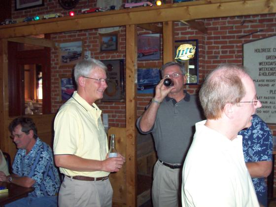 Doug Peterson and Wayne Weiss share a moment.